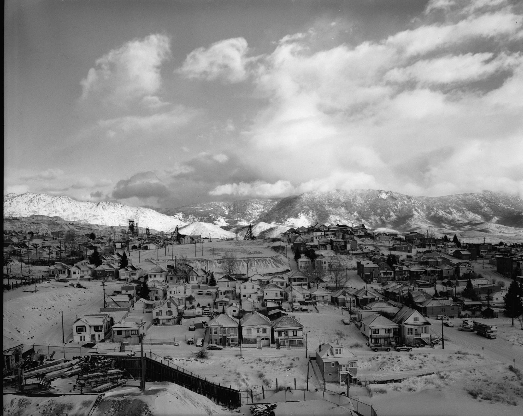 Winter view east across Butte, Montana from the top of the Anselmo headframe, mountains beyond