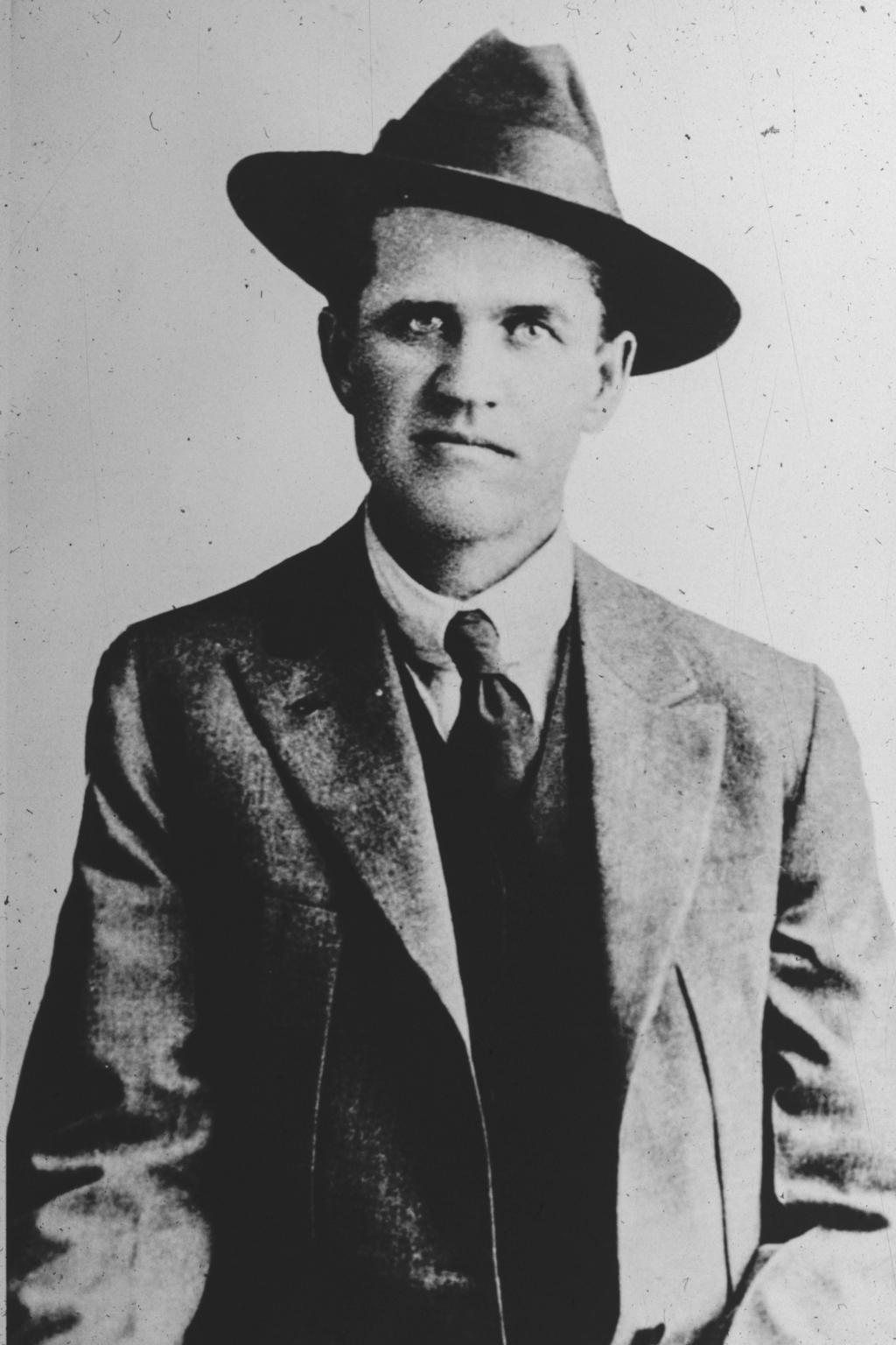 Portrait of IWW organizer Frank Little in a suit and fedora, 1917